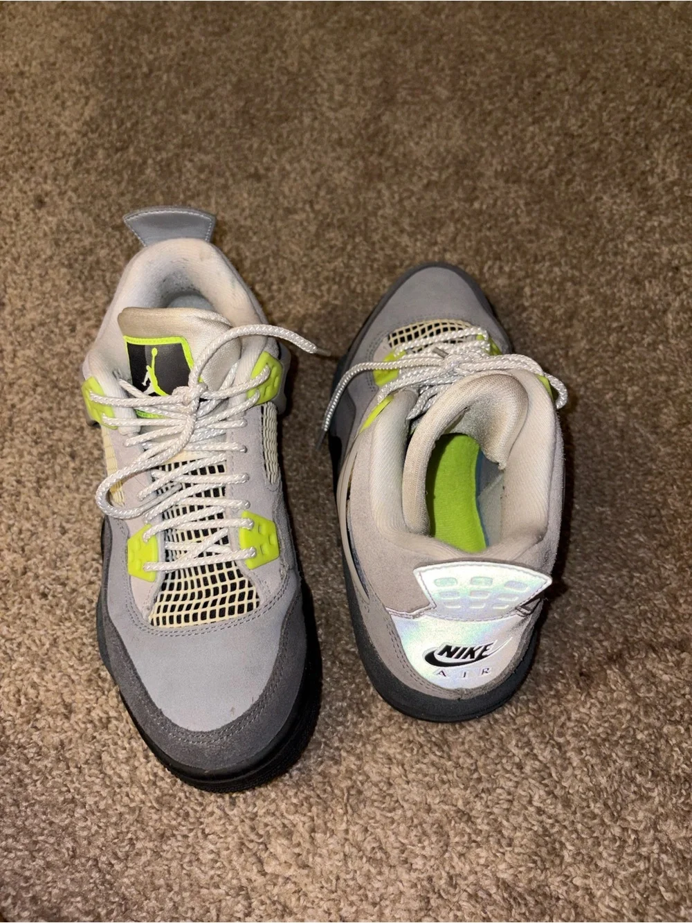 Retro 4 grey and neon green Jordan’s